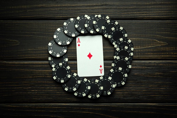 Ace playing card with black chips